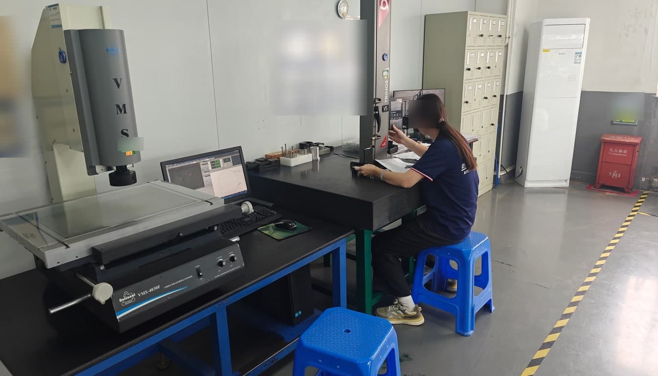 Vision measuring system checking part dimensions optically